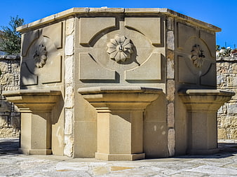 Octagonal stone fountain in Psematismenos, Cyprus