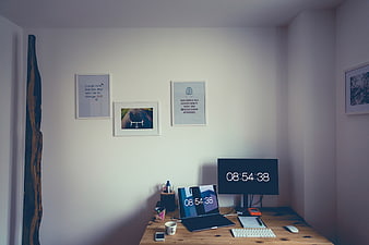 Modern home office workspace with laptop and monitor