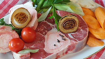 Raw beef bone marrow with vegetables for soup preparation