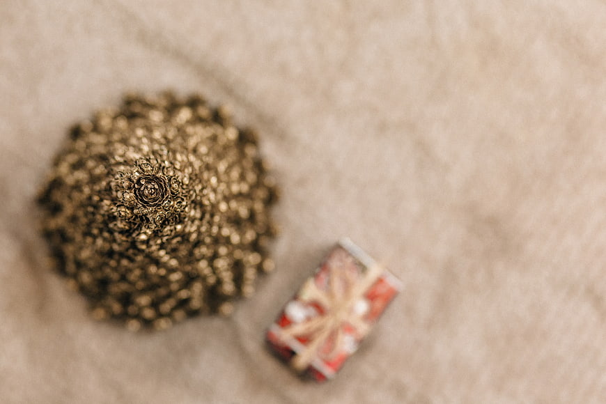 Blurred Christmas Tree and Gift on Beige Background