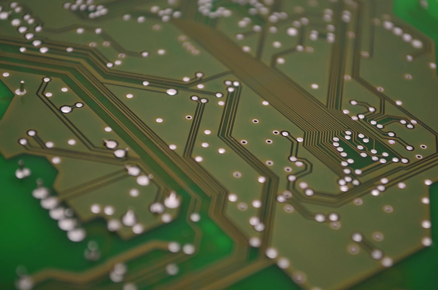 Macro Close-Up of Green Printed Circuit Board Traces