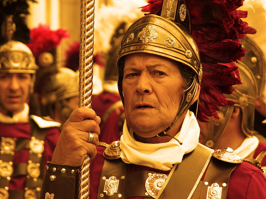 Roman Soldier In Golden Armor And Red Plume