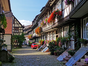 Charming cobblestone street in a traditional German half-timbered village