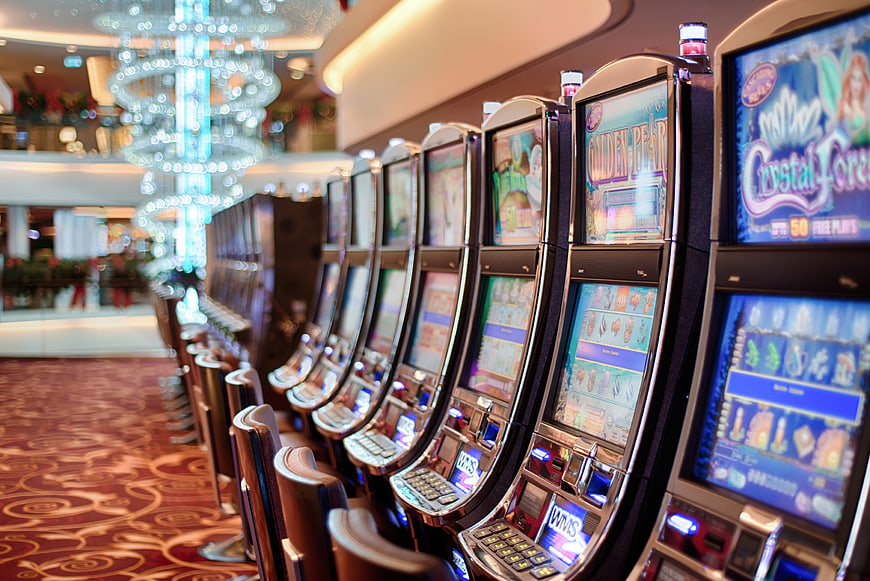 Row of Slot Machines in a Luxury Casino Interior