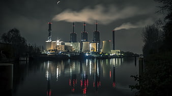 Industrial Power Plant Reflection on Canal at Night