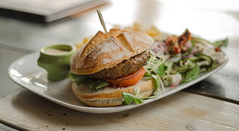 Gourmet Veggie Burger with Salad on White Plate