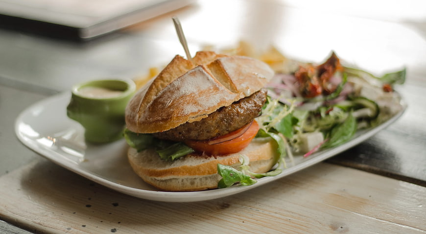 Gourmet Veggie Burger with Salad on White Plate
