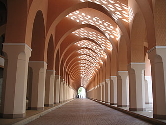 Perspective of Islamic Mosque Arcade with Geometric Light Patterns