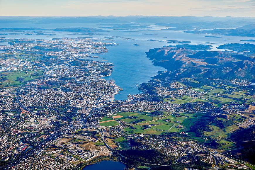 Aerial View of Coastal City and Fjord Landscape