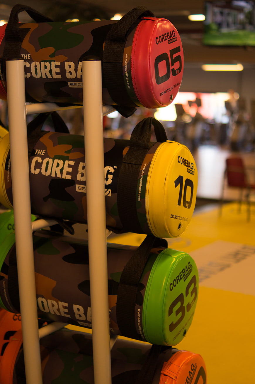 Colorful Core Bags on Gym Rack