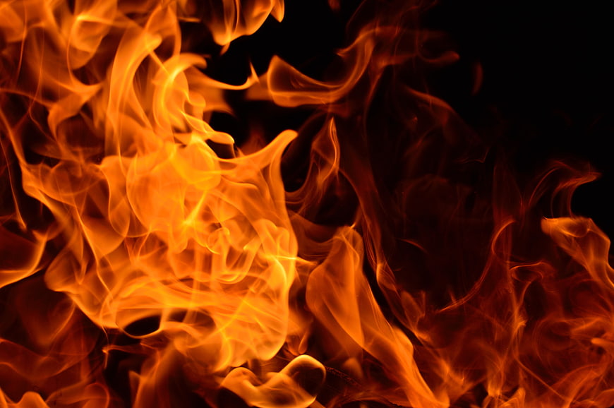 Vibrant Orange Flames on Black Background