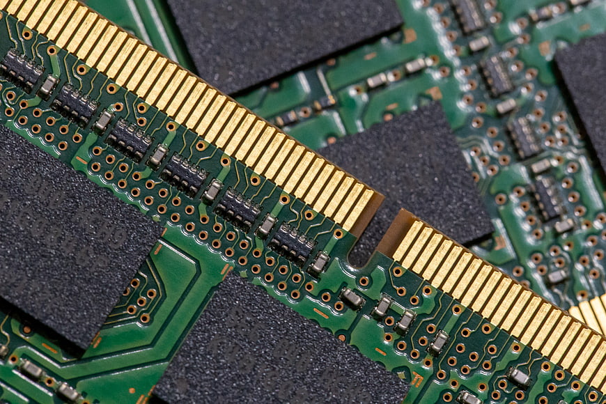Close-up of green RAM memory module circuit board
