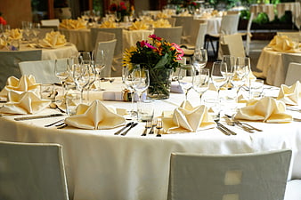Elegant Wedding Reception Table Setting with Flowers