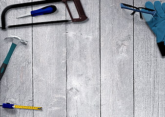 Handyman tools on white wooden background with copy space