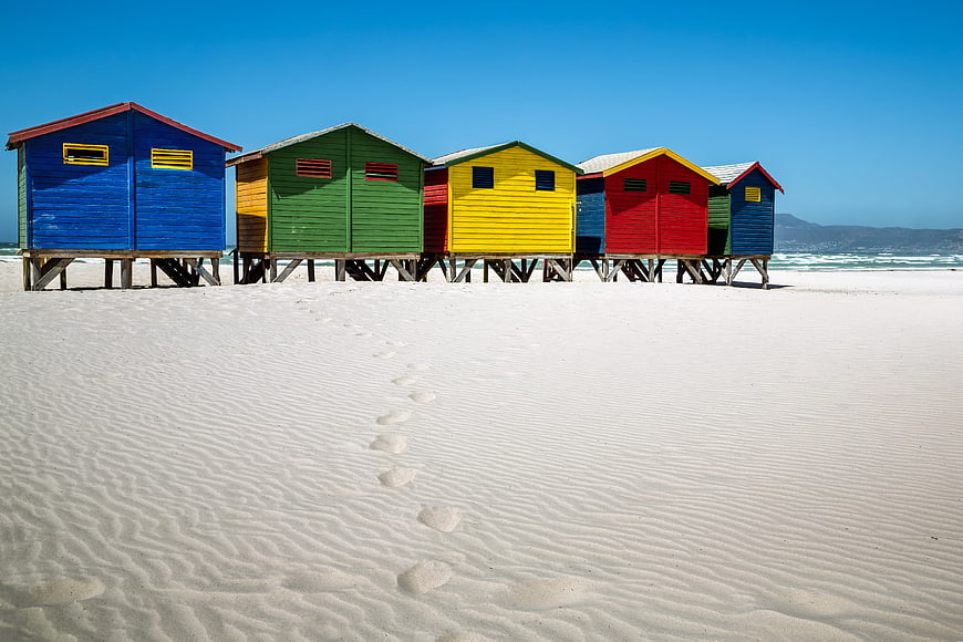 Colorful Beach Huts On White Sand In Muizenberg, South Africa
