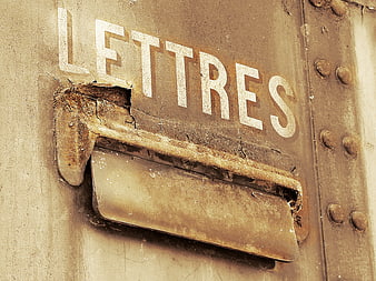 Weathered 'Lettres' Mailbox On Old Rusty Train Wagon