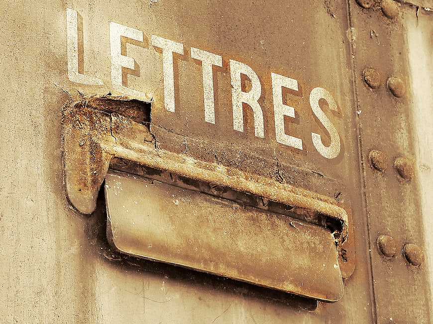 Weathered 'Lettres' Mailbox On Old Rusty Train Wagon