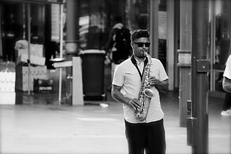 Street Musician Playing Saxophone in Black and White