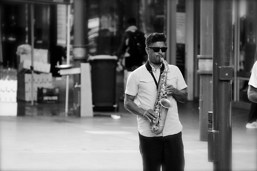 Street Musician Playing Saxophone in Black and White