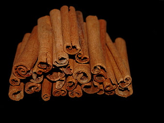 Cinnamon Sticks Arrangement On Black Background