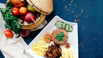 Thai Beef Salad With Rice, Cucumber, and Fresh Vegetables