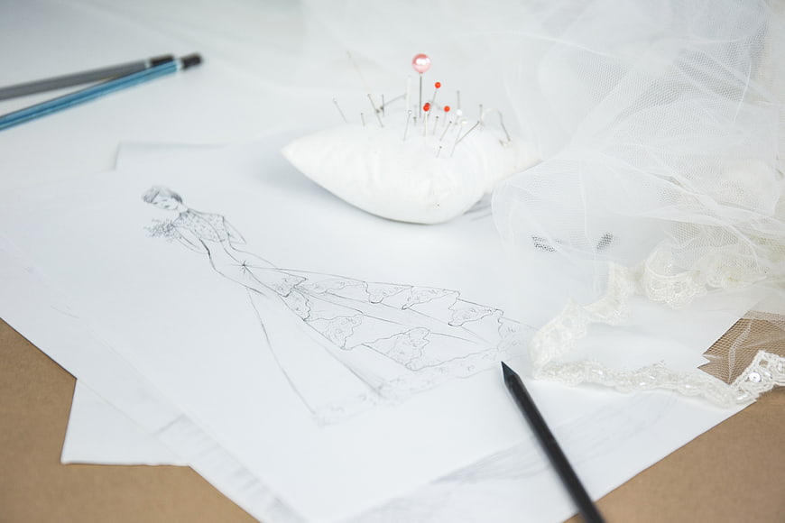 Fashion design sketch of wedding dress with sewing tools