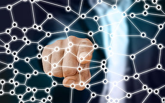Hand touching digital network nodes on dark blue background
