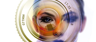 Creative woman's eye inside camera lens graphic