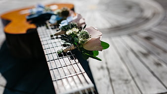 Wedding Boutonniere on Acoustic Guitar Neck