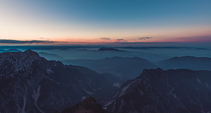 Majestic Mountain Range at Sunset with Sea of Fog
