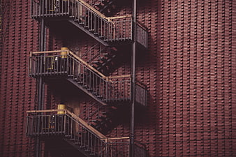Industrial Fire Escape on Red Brick Wall
