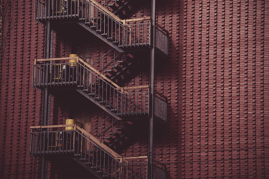 Industrial Fire Escape on Red Brick Wall