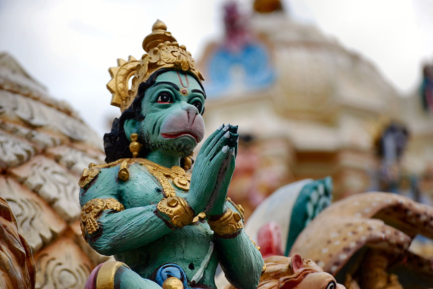 Colorful Hanuman Statue with Prayer Hands at Hindu Temple