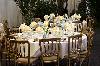 Elegant Wedding Reception Table Setting with Gold Chiavari Chairs