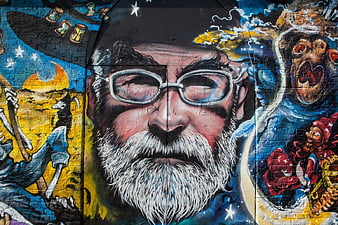 Colorful Street Art Mural of Man with Glasses and Beard