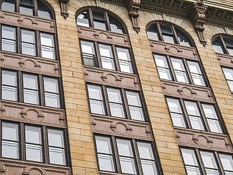Ornate Arched Windows on Historic Building Facade