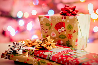 Festive Christmas Gifts with Bows and Bokeh Lights