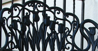 Black wrought iron tulip railing design detail