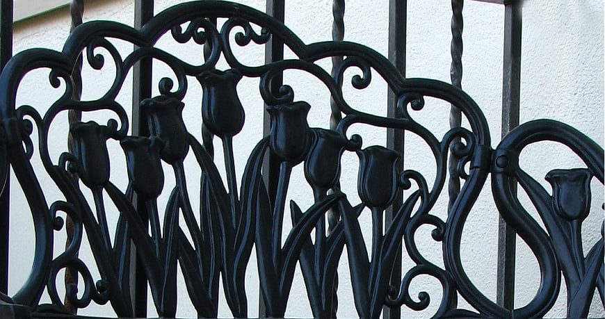 Black wrought iron tulip railing design detail