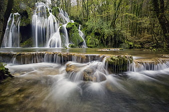 Serene Forest Waterfall with Smooth Flowing Water