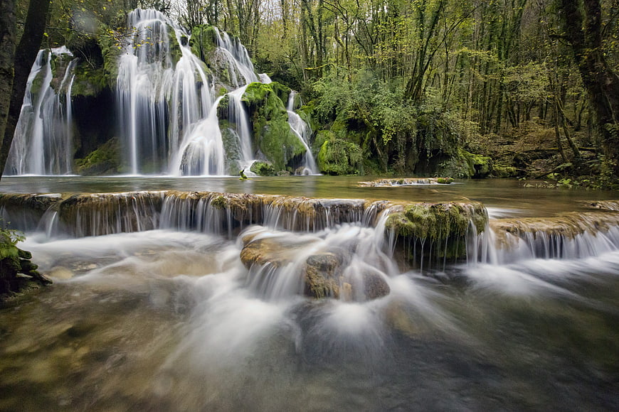 Serene Forest Waterfall with Smooth Flowing Water