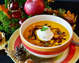 Autumn Pumpkin Soup with Cream, Seeds, and Balsamic Drizzle