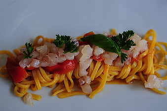 Spaghetti with Shrimp and Tomato Sauce on White Plate