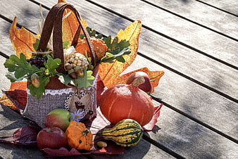 Autumn Harvest Basket With Pumpkins, Apples, And Fall Leaves