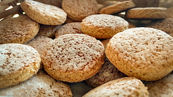 Close-up of freshly baked almond cookies with sugar topping