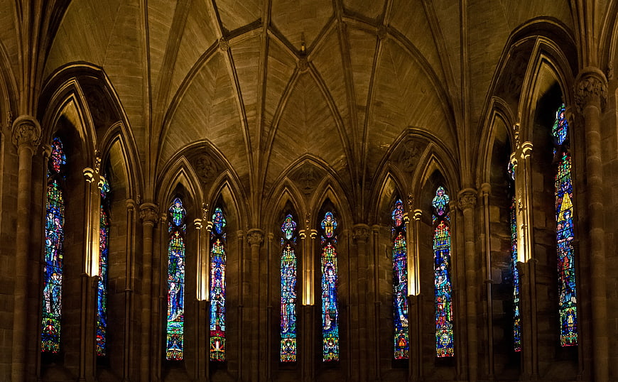 Gothic Cathedral Interior with Stained Glass Windows