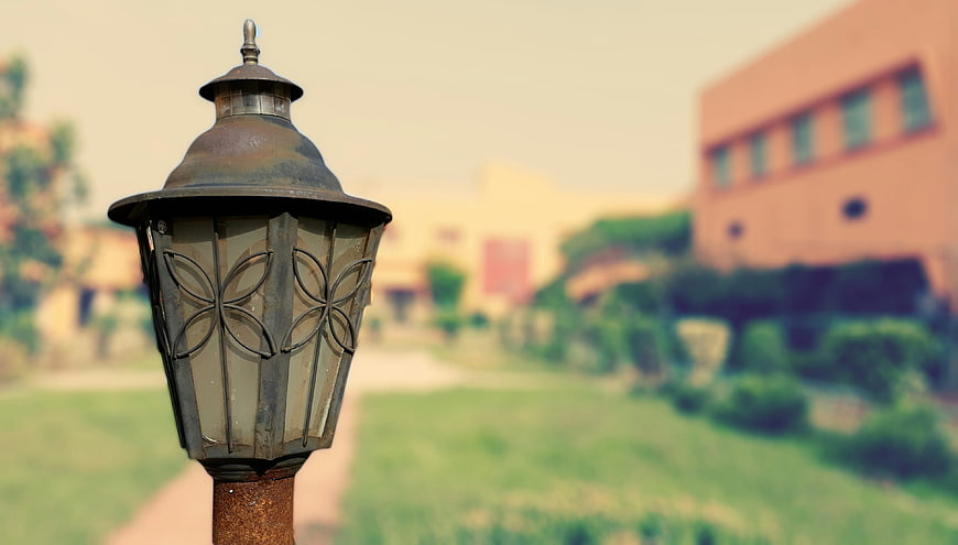 Vintage Rustic Lamppost in Garden Setting