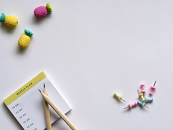 Minimalist White Desk Flat Lay With Weekly Plan Notepad And Pencil