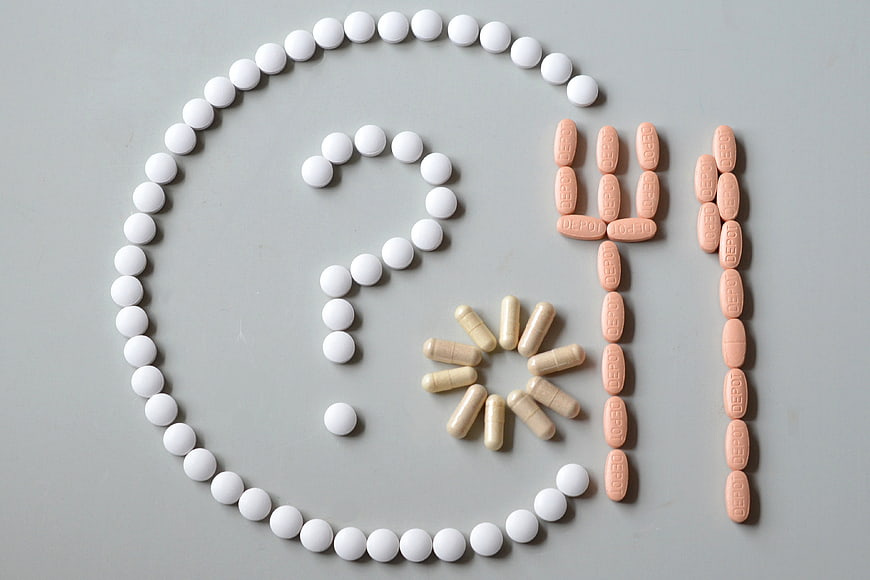 Pills Arranged as Clock Face Showing Time