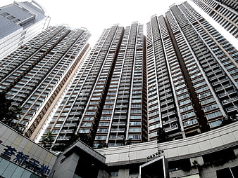 Low angle view of dense high-rise residential skyscrapers